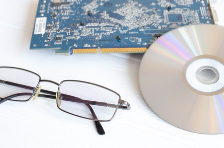 The abstract image of the technician repairing inside of hard disk drive by screwdriver. the concept of data, hardware, technician and technologyの写真素材