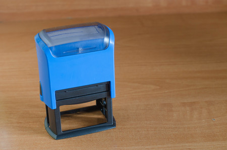 Close-up Rubber Stamp On wood table background