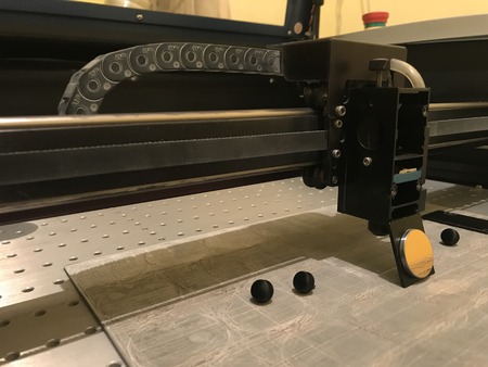 Laser engraver for the manufacture of seals and stamps