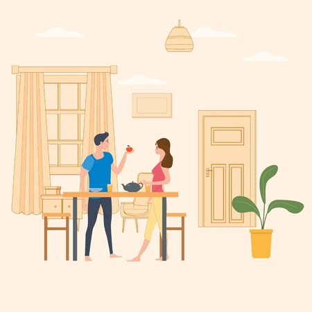 Smiling man and woman standing in kitchen, eating snacks and feeding each otherのイラスト素材