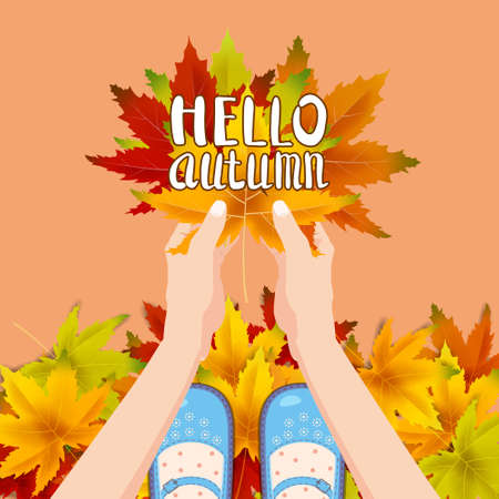 Women blue shoes on autumn leaves. Hands holding autumn leaves. Lettering Hello Autumn. Poster, banner vector illustration isolatedのイラスト素材