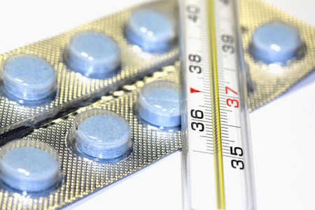 thermometer and drugs medical backgroundの写真素材