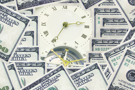 Money - time. Clock and banknotes.の写真素材