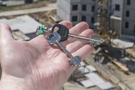 Keys from new apartments in the background construction.の写真素材