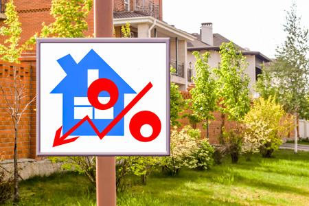 A Billboard advertising the sale of real estate. The concept of changes in housing pricesの写真素材