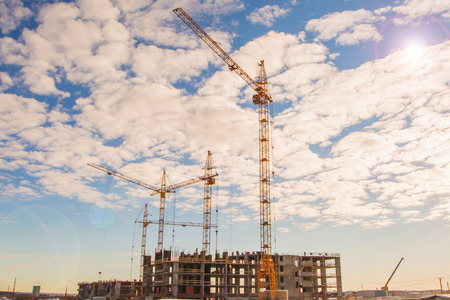 The construction of new houses on a background skyの写真素材