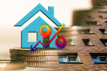 The symbol of real estate. The concept of price changes on the real estate marketの写真素材