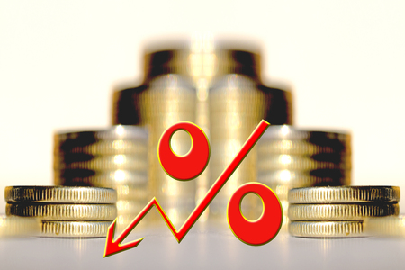 The percent symbol on the background of bars coins. The concept of mortgage lending.の写真素材