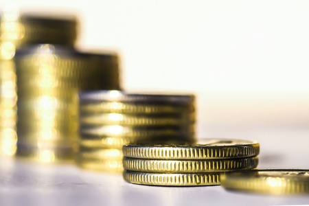 Coins stacked in bars. The concept of revenue growthの写真素材