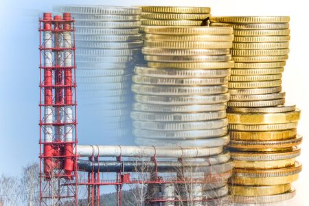 Production factory pipes on the background of money. The concept of cost of production.の写真素材