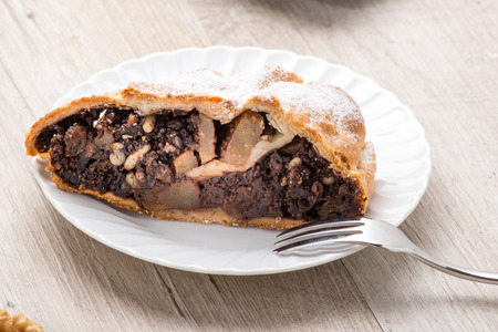 Strudel with walnuts, pears, honey and cocoaの写真素材