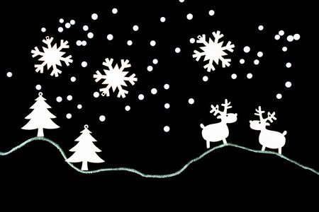 Christmas decorative wooden tiles for tree decoration on black background.の写真素材