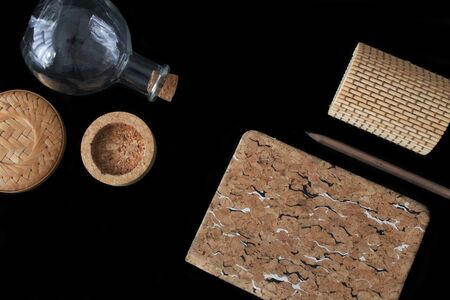 Home decor on black background. Wooden element for home office and business style.