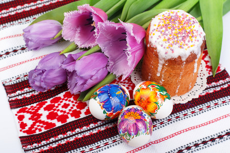 Easter eggs, easter cake and tulips