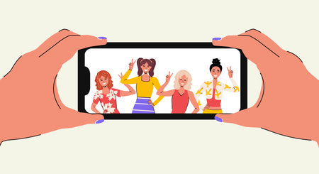 group of people take pictures with their phones. Flat style. Characters. Smartphone. Hands holding phone and looking at photo. Ð¡amera. Happy women smile and show hand signs. Vectorのイラスト素材
