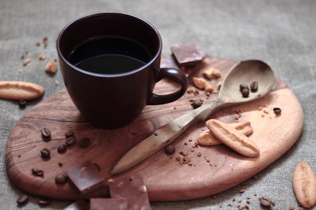 warm cup of caffee on brown backgroundの写真素材