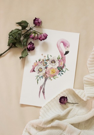 Workspace. Exotic flowers and flamingo painted with watercolor, paintbrush, isolated on white background. Overhead view. Flat lay, top viewの写真素材