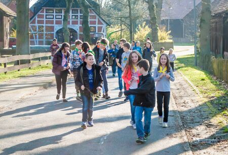 Krelingen, Germany 03.29.2019: Children resting in the camp stroll through the villageのeditorial素材