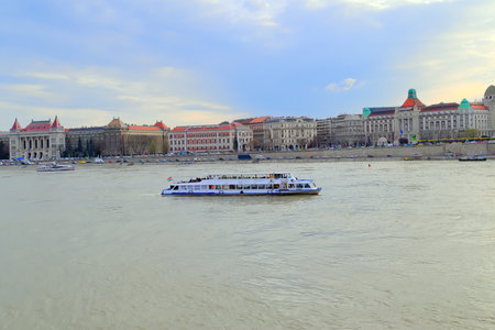 Budapest, Hungary, March 19, 2019: Spring Budapest, Danube river, dusk, pleasure boat on the riverのeditorial素材