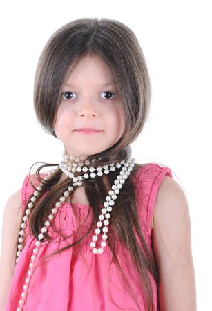 Portrait of the little girl with a pearl beads on a neckの写真素材