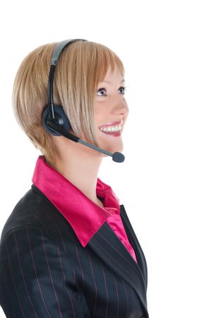 Beautiful woman-operator with headphone smiles. Isolated on white backgroundの写真素材