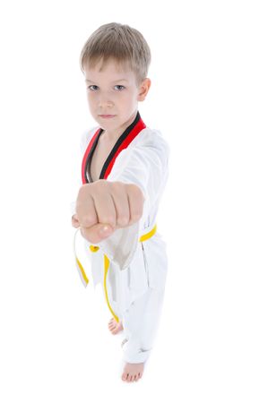 Young athlete demonstrates his fist. Isolated on white backgroundの写真素材