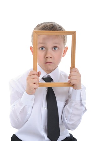  little boy with a frame in his hands. Isolated on white backgroundの写真素材