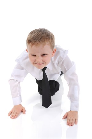  little boy got ready to run. Isolated on white backgroundの写真素材