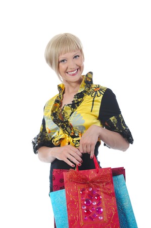 Beautiful young blonde with bags. Isolated on white backgroundの写真素材