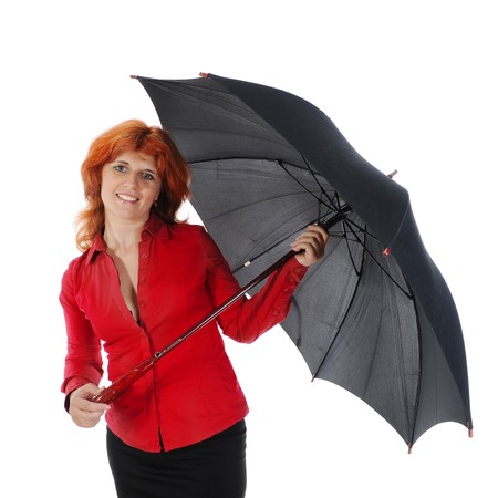 young girl with an umbrella. Isolated on white backgroundの写真素材