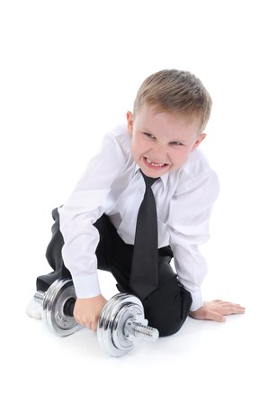 boy in the shirt lifts weights. Isolated on white backgroundの写真素材