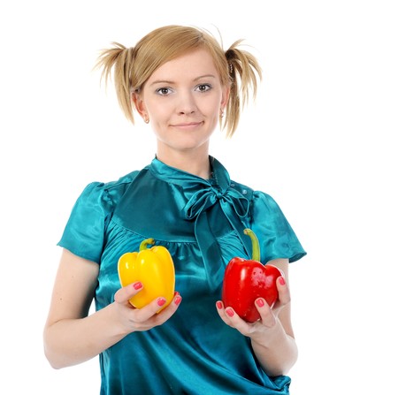 Beautiful girl with pepper. Isolated on white backgroundの写真素材