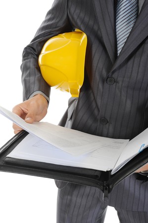 Businessman with construction helmet. Isolated on white backgroundの写真素材