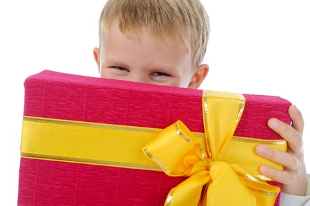 boy holding gift box . Isolated on white backgroundの写真素材
