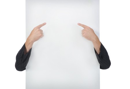 Hands on a billboard. Isolated on white backgroundの写真素材