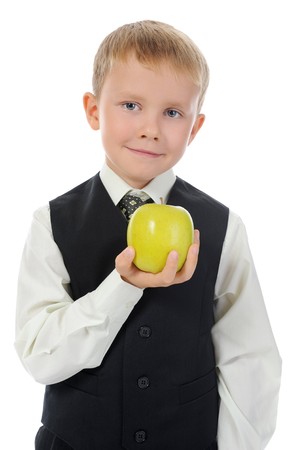 boy holds an apple. Isolated on white backgroundの写真素材