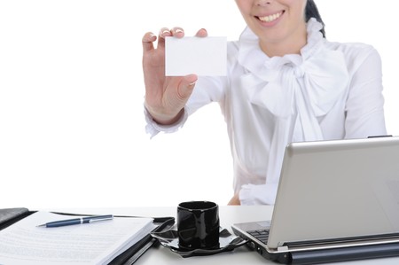 Businesswoman handing a blank business card. Isolated on white backgroundの写真素材