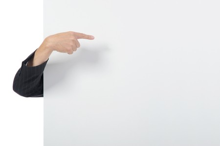 Hand on a billboard. Isolated on white backgroundの写真素材