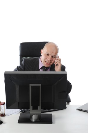 businessman in the office talking on the phone. Isolated on white backgroundの写真素材