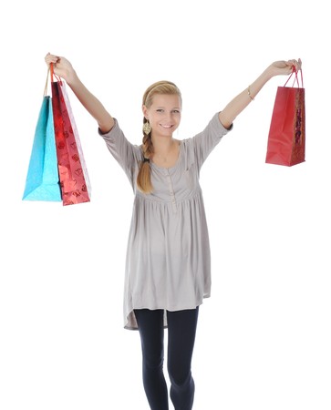 blonde with shopping bags. Isolated on white backgroundの写真素材