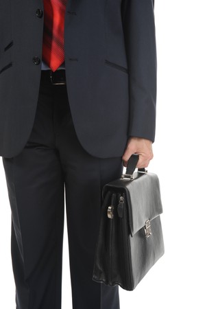 Image of a businessman holding a briefcase. Isolated on white backgroundの写真素材