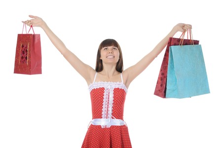 beautiful girl with shopping bags. Isolated on white backgroundの写真素材
