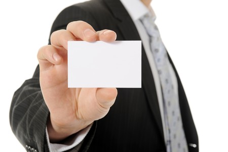 Image of a businessman holding a blank in the hand. Isolated on white backgroundの写真素材