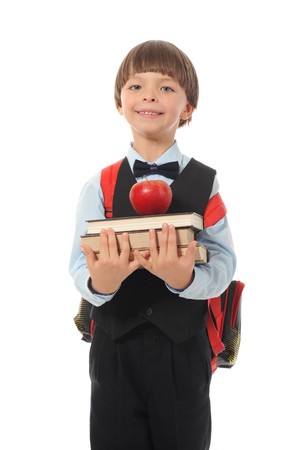 boy holds a stack of books. Isolated on white backgroundの写真素材