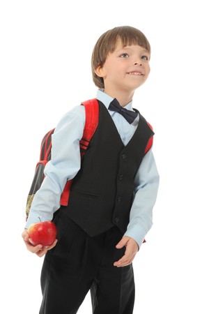 Schoolboy with a briefcase behind. Isolated on white backgroundの写真素材