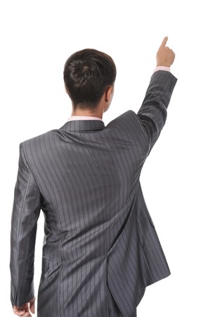 Businessman points finger upの写真素材