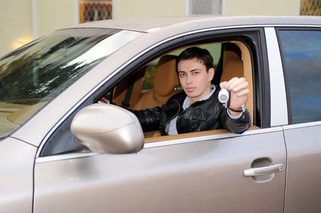 man showing the keys の写真素材