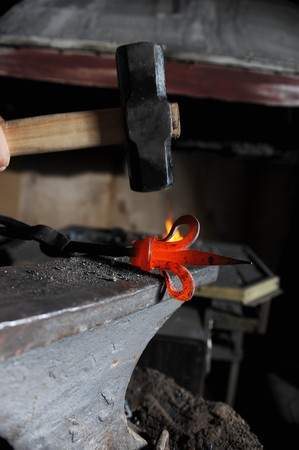 Making a decorative pattern on the anvilの写真素材