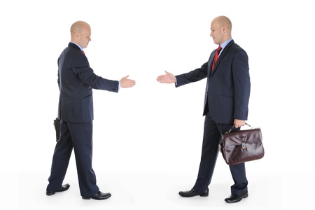 Two businessmen stretched out their hands for a handshake. Isolated on white backgroundの写真素材