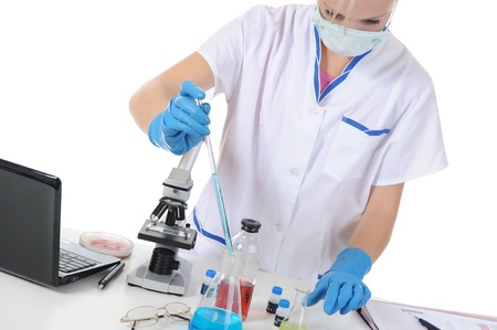 young scientist working in a bright room at the laboratory. Isolated on white backgroundの写真素材